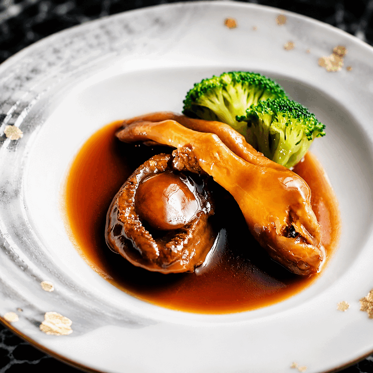 Braised whole abalone — chef's plating